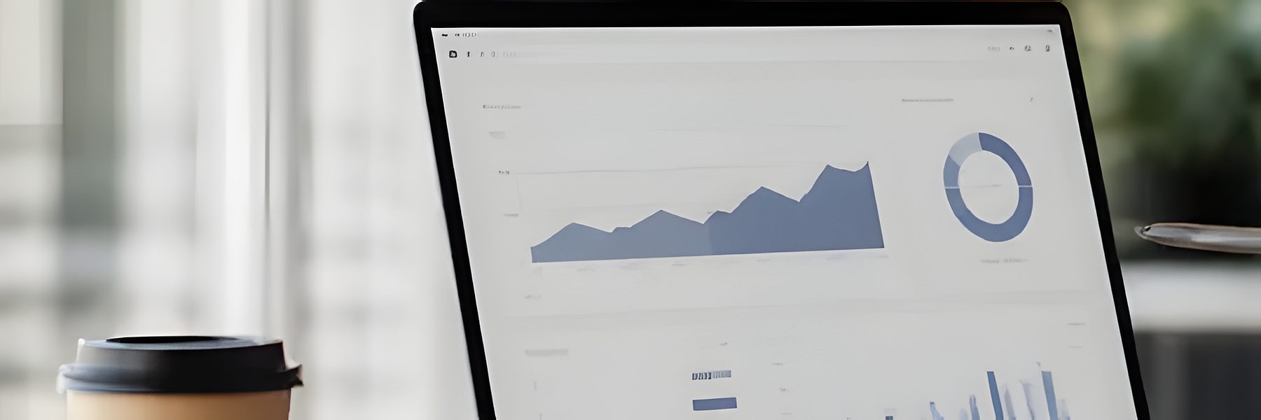 Laptop showing a SaaS SEO analytics dashboard